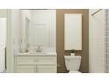 Stylized bathroom with a floating vanity, quartz countertop, and shower/tub combo with modern fixtures and a framed mirror at 9816 Minnow Ray Dr, Land O Lakes, FL 34638