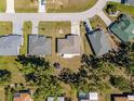 Aerial view of the property showing the house, the large backyard, and the neighborhood at 25337 Durango Ct, Punta Gorda, FL 33955