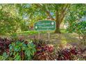 Charming community sign for Townhomes at Countryside, deed restricted community at 2897 Thaxton Dr # 62, Palm Harbor, FL 34684