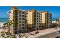 Exterior of building features a coastal location and balconies at 13600 Gulf Blvd # 700A, St Petersburg, FL 33708