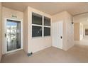 Condo entry shows the front door to unit 5403 with neutral paint and flooring at 6475 Shoreline Dr # 5403, St Petersburg, FL 33708