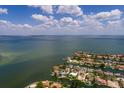 A scenic aerial view of a waterfront community with stunning open water views from all around the property at 2063 Illinois Ne Ave, St Petersburg, FL 33703