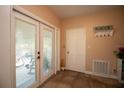 Functional mudroom with tile floors, access to the outside, and storage at 2132 40Th N Ave, St Petersburg, FL 33714