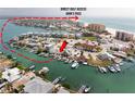 Beautiful waterfront home featuring a private boat dock with direct access to John's Pass and the Gulf at 248 137Th Cir, Madeira Beach, FL 33708