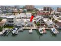 Charming waterfront home featuring a private boat dock, and serene water views at 248 137Th Cir, Madeira Beach, FL 33708
