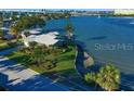 Waterfront home with beautiful landscaping and easy access to the bay at 502 Palm Dr, Largo, FL 33770