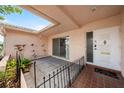 Cozy outdoor patio area with a sliding glass door, offering a private retreat at 5428 Larchmont N Ct # 5428, Pinellas Park, FL 33782