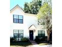 Inviting two-story home with well-maintained landscaping and a cozy entrance at 2302 Maki Rd # 24, Plant City, FL 33563
