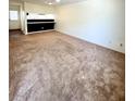 Spacious living room with ample natural light and neutral carpeting at 2302 Maki Rd # 24, Plant City, FL 33563