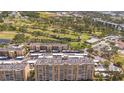 View of the residential complex with an adjacent golf course at 2618 Cove Cay Dr # 801, Clearwater, FL 33760