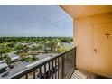 Balcony view of a golf course and pond at 2618 Cove Cay Dr # 801, Clearwater, FL 33760