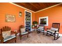 Inviting porch features ample seating, decorative touches, and a warm, welcoming atmosphere at 2623 57Th S St, Gulfport, FL 33707