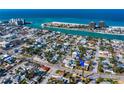 Scenic aerial view of a beachside community with residential houses and waterfront access at 500 79Th Ave, St Pete Beach, FL 33706