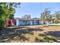 Inviting single-Gathering home with a well-maintained lawn, lovely landscaping, and a convenient side driveway at 510 55Th Ne Ave, St Petersburg, FL 33703