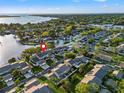 Waterfront townhome community with easy access to the ocean, surrounded by lush greenery at 6497 Cape Hatteras Ne Way # 3, St Petersburg, FL 33702