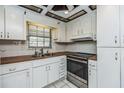 Functional kitchen with stainless steel appliances and ample counter space at 122 N Kings Ave # 101, Brandon, FL 33510