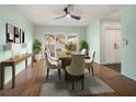 Bright dining room features a table, chairs, and sliding glass doors to the outdoor area at 14199 82Nd Avenue, Seminole, FL 33776