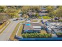 An aerial view showcasing the property's layout, backyard space, and neighborhood surroundings at 1760 Sharondale Dr, Clearwater, FL 33755