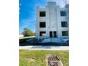 Under-construction townhome with concrete block framework highlighting the development's structural progress at 4723 W Price Ave # 2, Tampa, FL 33611