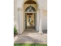 Grand entryway with arched doorway and classic design elements at 927 Anchorage Rd, Tampa, FL 33602