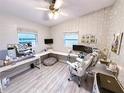 Stylish bedroom featuring wood-look floors and a ceiling fan at 1228 Pineview Ave, Clearwater, FL 33756