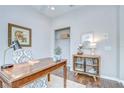 Home office with hardwood floors, closet, a storage cabinet, and decor at 16501 Sandhill Crane Dr, Spring Hill, FL 34610