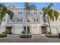 Charming townhome complex showcasing well-maintained facades, and inviting curb appeal at 5912 Anchorage S Way, St Petersburg, FL 33712