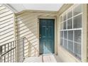 The front door is painted teal and has the unit number 314 clearly displayed at 9100 Dr Martin Luther King Jr N St # 314, St Petersburg, FL 33702