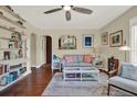 Cozy living room featuring hardwood floors, comfortable seating, and stylish decor at 2049 Broadway, Clearwater, FL 33755