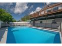 Backyard pool with an attached upper balcony at 3212 W Arch St, Tampa, FL 33607