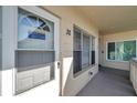 View of the front door and adjacent windows of the condo at 2452 Brazilia Dr # 32, Clearwater, FL 33763