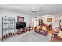 A cozy living room with comfortable furniture, including leather sofas at 2452 Brazilia Dr # 32, Clearwater, FL 33763