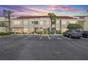 Exterior of condo building with well-maintained landscaping and convenient parking at 6191 Bahia Del Mar Blvd # 204, St Petersburg, FL 33715