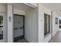 Exterior front door and unit number 204 with covered walkway at 6361 Bahia Del Mar Blvd # 205, St Petersburg, FL 33715