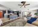Open floor plan with large island, stainless appliances, dining room and spacious living area at 10101 Mangrove Well Rd, Ruskin, FL 33573