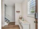 Bright foyer with hardwood floors, and elegant decor, offering a warm welcome at 2700 Bayshore Blvd # 522, Dunedin, FL 34698