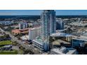 Modern high-rise condo featuring stylish architecture, balconies, and a rooftop pool offering stunning city views at 301 1St S St # 3004, St Petersburg, FL 33701
