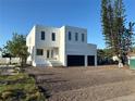 Striking new construction boasts modern design with a two-car garage and manicured landscaping at 4716 W Lawn Ave, Tampa, FL 33611