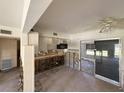 An unfinished kitchen with white cabinets and room to create the kitchen of your dreams at 7365 Royal Palm Dr, New Port Richey, FL 34652