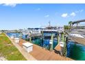 View of a boat dock area with boat lifts for easy storage, showcasing waterfront lifestyle at 0 Beach Se Dr # 162Ss, St Petersburg, FL 33705