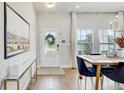 Elegant foyer with hardwood floors, a glass door and large windows with natural light at 2190 Fairway S Ave, St Petersburg, FL 33712