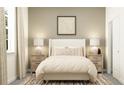 Cozy bedroom with neutral tones, matching nightstands and lamps, and ample natural light at 11857 Sparkling Topaz Cv, Parrish, FL 34219