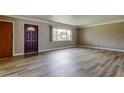Inviting living room with large window and new flooring at 1516 Lemon St, Clearwater, FL 33756