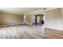 Open-concept living area features new flooring and a neutral color scheme at 1516 Lemon St, Clearwater, FL 33756