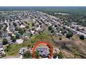 Aerial view showcasing the property's location within a well-developed residential community at 24314 Landing Dr, Lutz, FL 33559