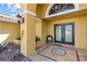 Inviting front porch with tiled flooring, decorative accents, and a cozy seating area at 8014 12Th S Ave, St Petersburg, FL 33707