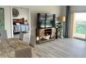 Living area featuring a dining table and view to the bedroom at 880 Mandalay Ave # C704, Clearwater Beach, FL 33767