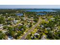 Aerial view of the neighborhood, showcasing the property's proximity to the bay and surrounding residential area at 311 83Rd Ne Ave, St Petersburg, FL 33702