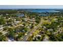Aerial view of the neighborhood, showcasing the property's proximity to the bay and surrounding residential area at 311 83Rd Ne Ave, St Petersburg, FL 33702