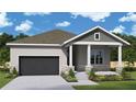 Charming single-story home features a stylish front porch, stone accents, and an attached two-car garage at 4244 11Th N Ave, St Petersburg, FL 33713
